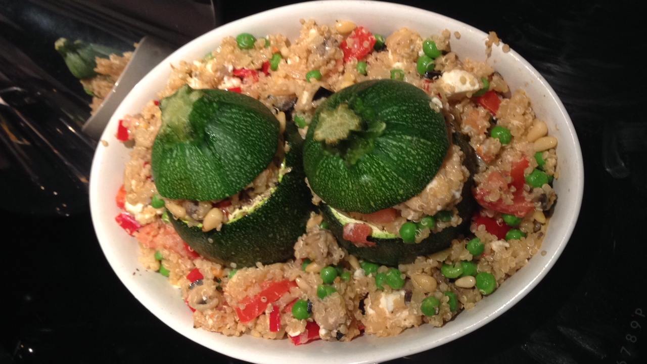 Zucchinis filled with vegetables and quinoa